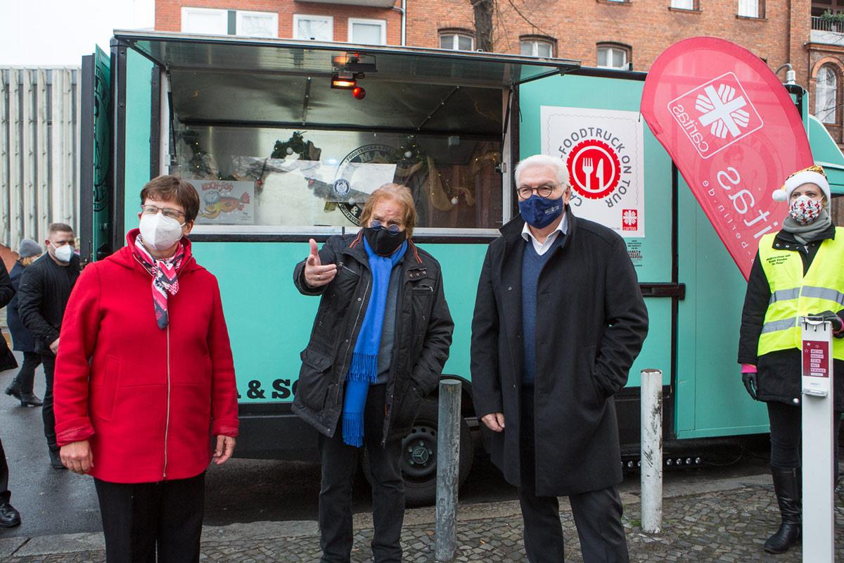 Bundespräsident mit Caritas-Team